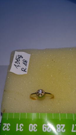 Pierścionek złoty z diamentami w cenie 1800 zł