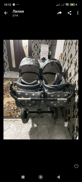 Коляска для двійні