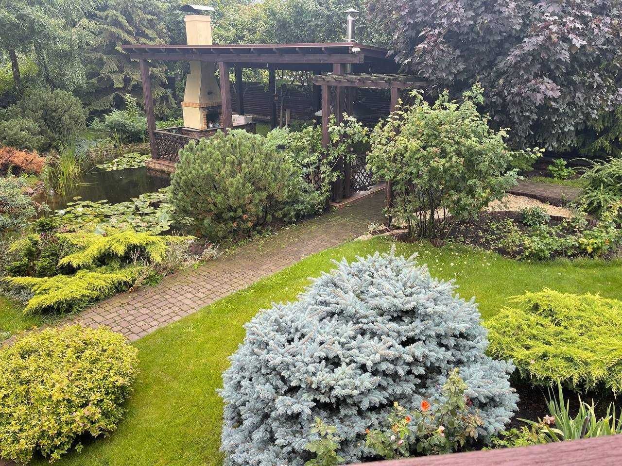 Комфортабельный дом с участком потрясающей красоты в Святопетровское!