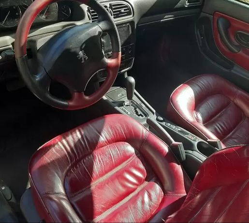 красный Peugeot 406 (салон кожа)
