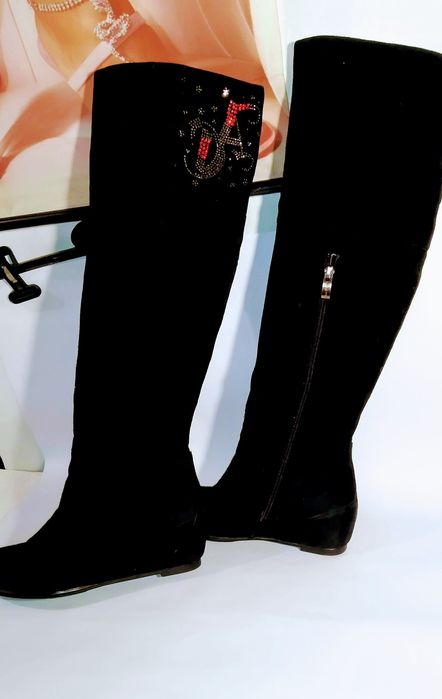 Высокие зимние сапоги