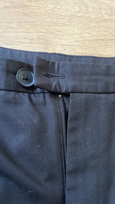 Calças de tecido pretas