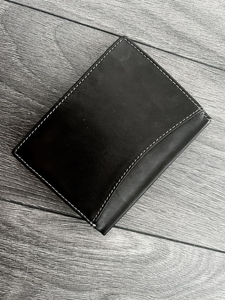 Skórzany portfel męski pionowy czarny NOWY