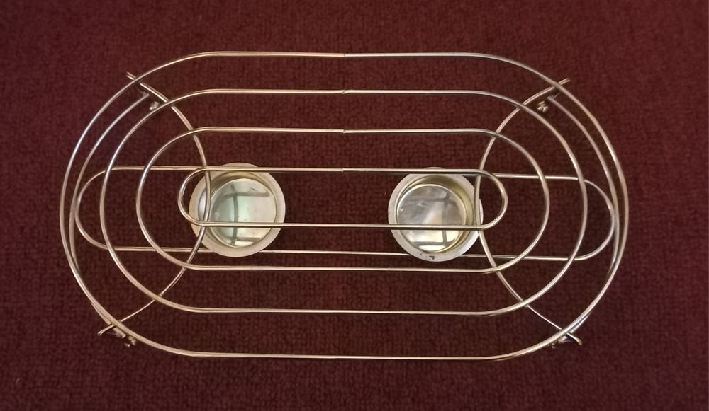 Owalna metalowa podstawka pod garnek/podgrzewacz"