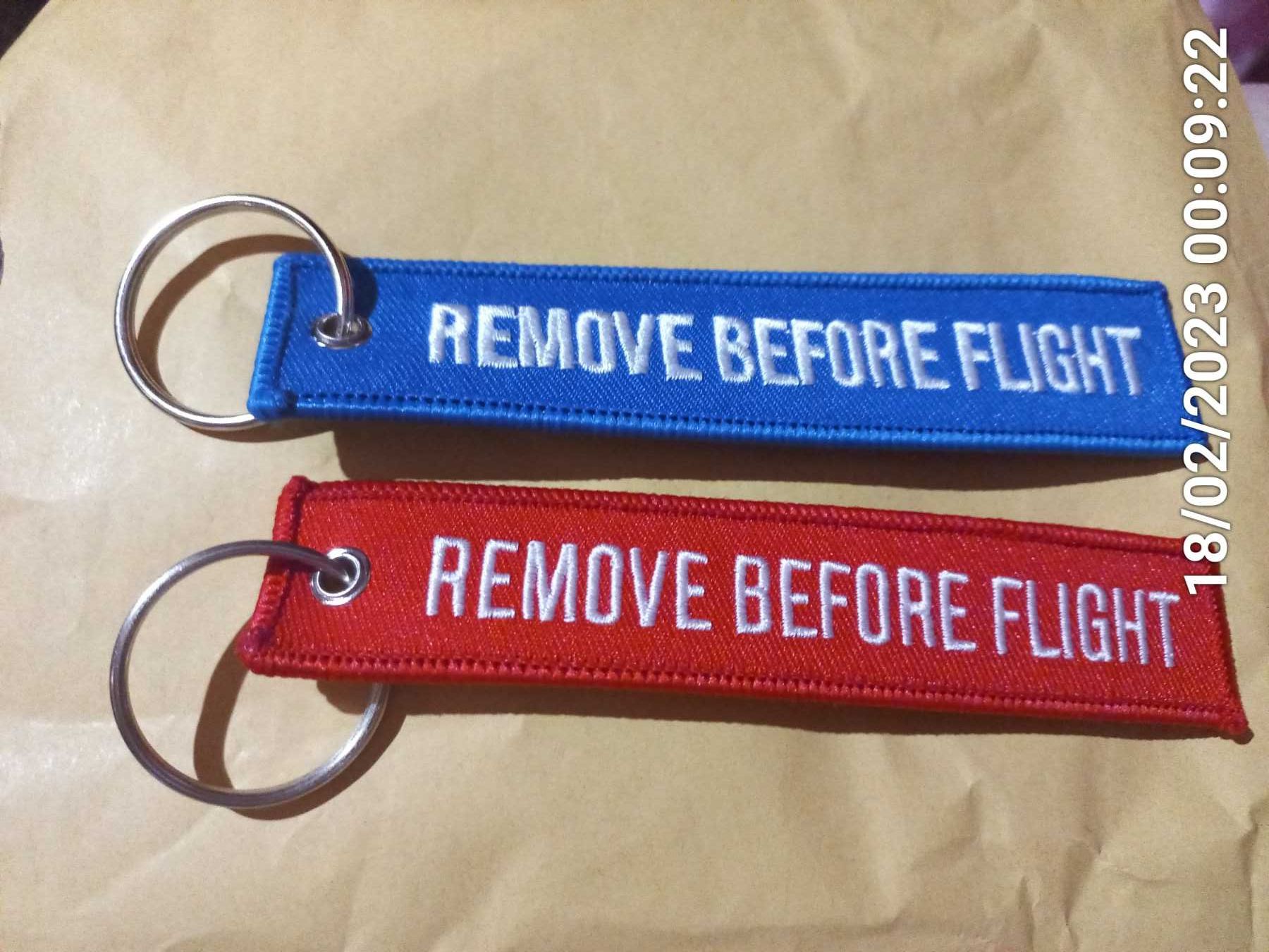 коллекция ремувка ремув брелок Remove Before Flight красная