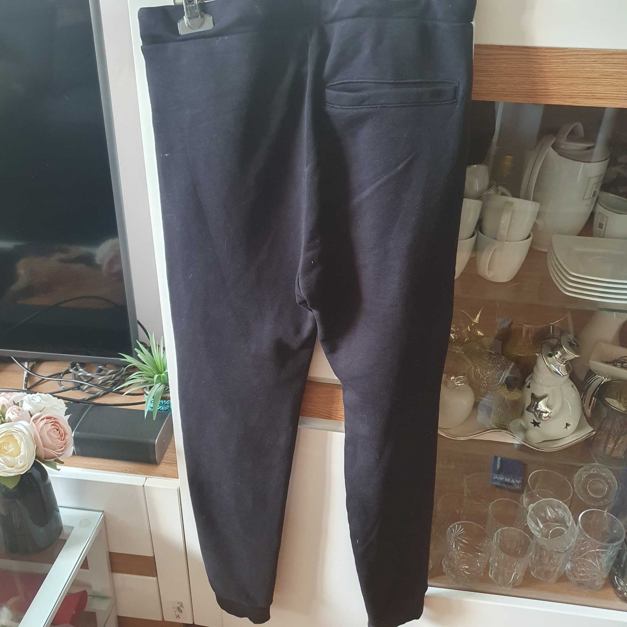 Spodnie dresowe 4f 164 cm