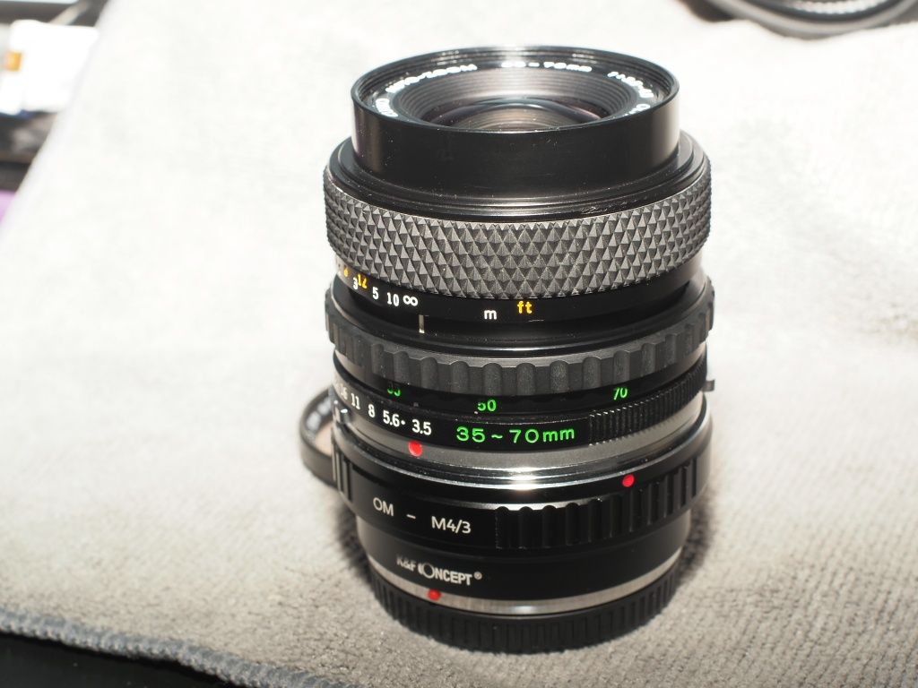 Obiektyw Oly om-system S zuiko auto-zoom 38-70 1:3,5-4,5 + K&F OM-M4/3