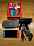 Nintendo Switch OLED zestaw + etui + karta SD
