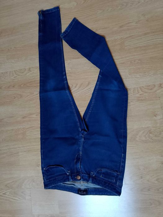Jeansy Mohito 42 granatowe
