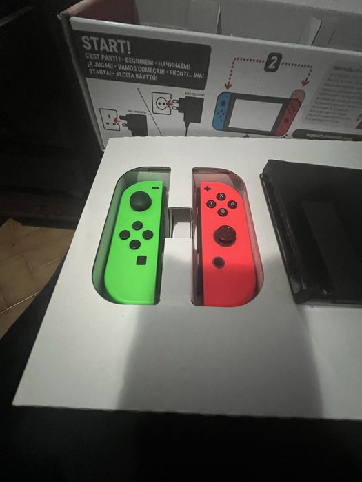 Nintendo switch v1 +256gb 20 jogos