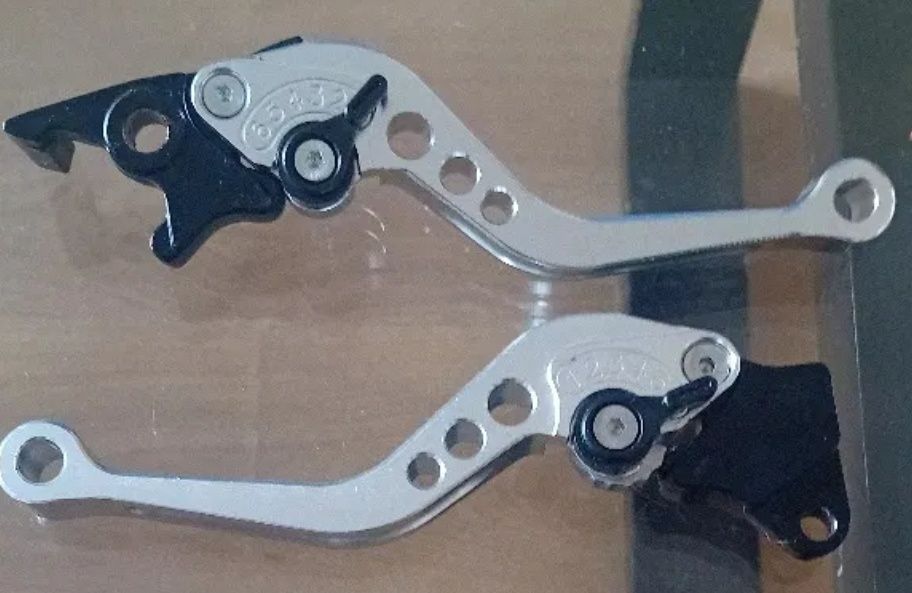 Manetes para selim e velocidade para motas