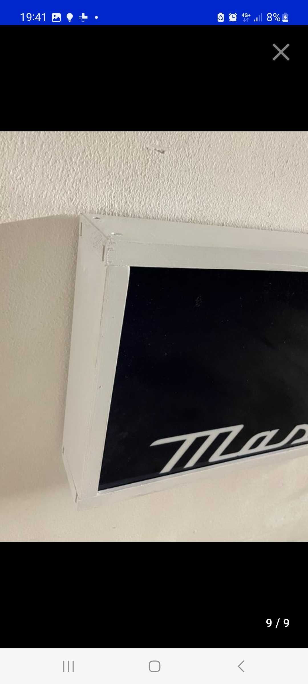 Sinal luminoso maserati