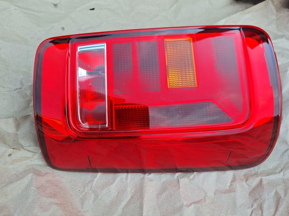 Фонари фольксваген кадди 4 ,1300 гр .шт.