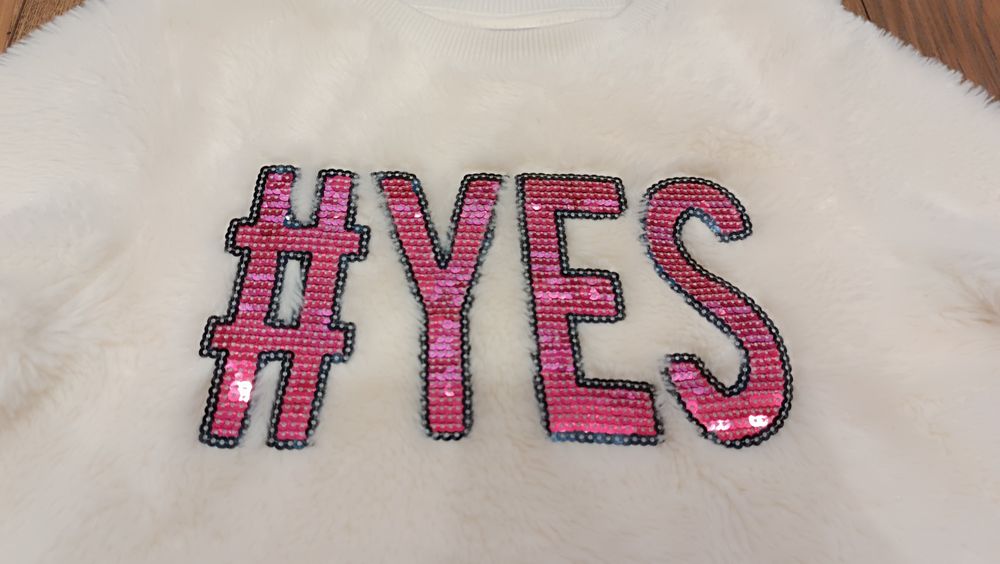 Bluza 122 - 128 kremowa typu miś dla dziewczynki C&A