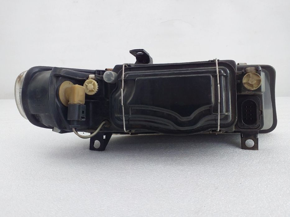 Ótica / farol esquerda SEAT Leon (1M1)