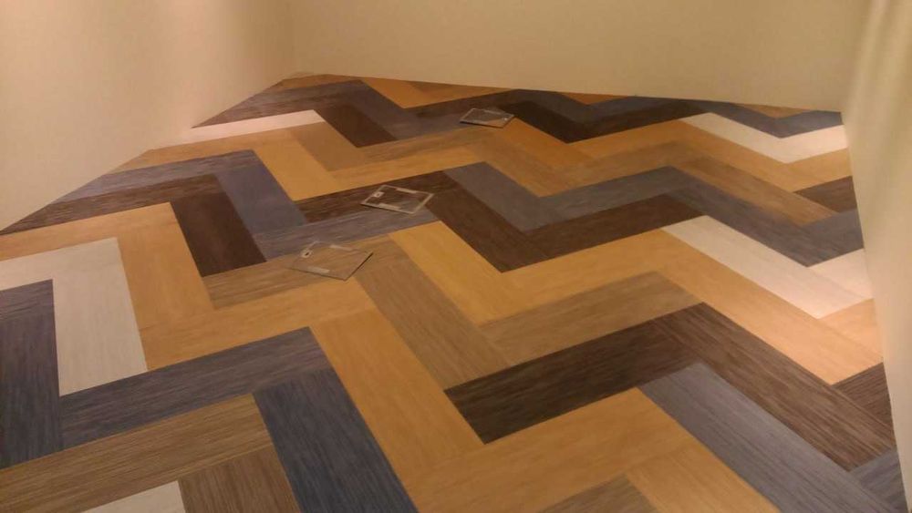 Укладка ламінату, вінілових покриттів, паркетної дошки. Шпалери