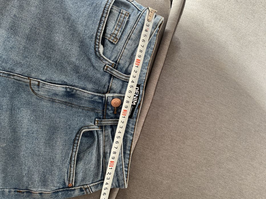 Джинси кльош з розрізом М 46