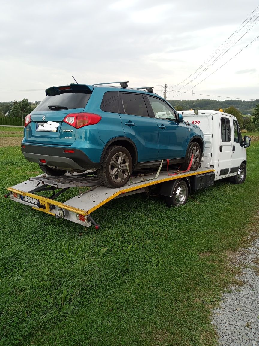 Autolaweta przewóz rzeczy transport pomoc drogowa