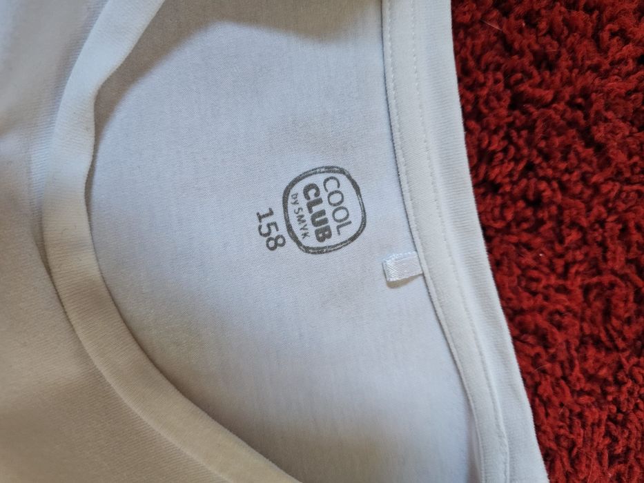 Bluzka z motywem srebrnej planety. Rozm. 158