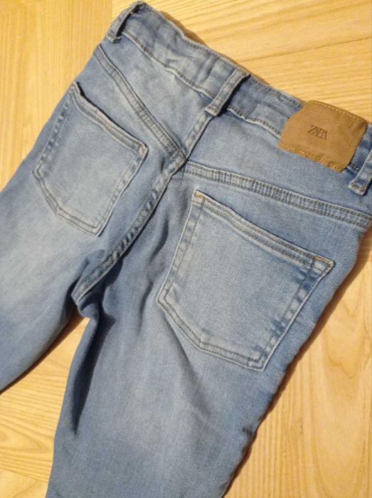 Spodnie z przetarciami dziurami ZARA 152 jeansy