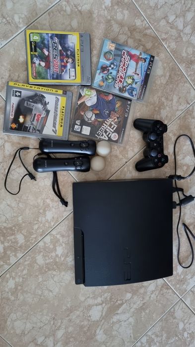 PS3 with controller and 2 Move controllers64309602213251121