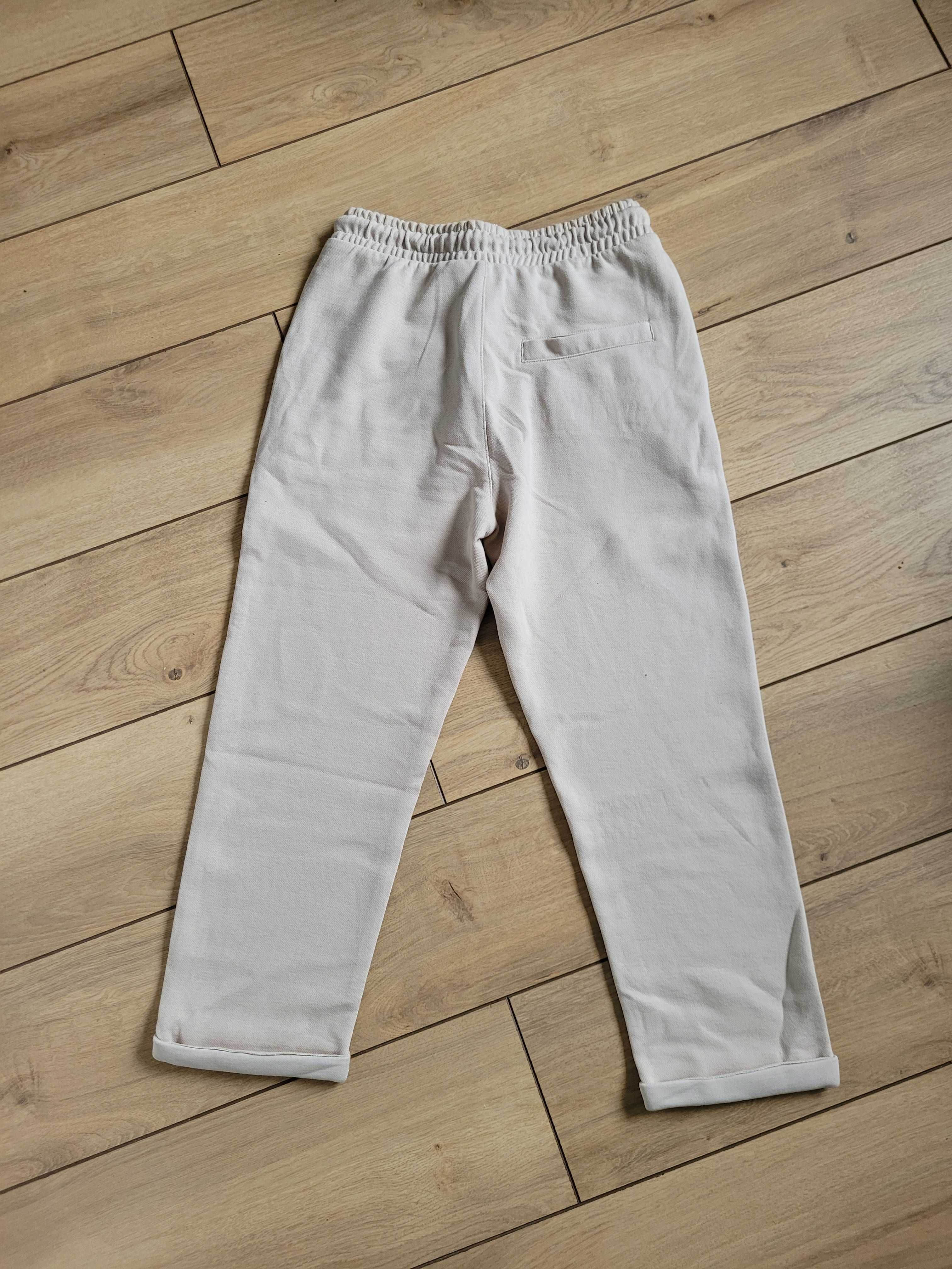Nowe długie spodnie chłopięce Reserved 134 8 lat chino miękkie