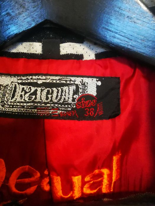 Casaco desigual 38 em muito bom estado