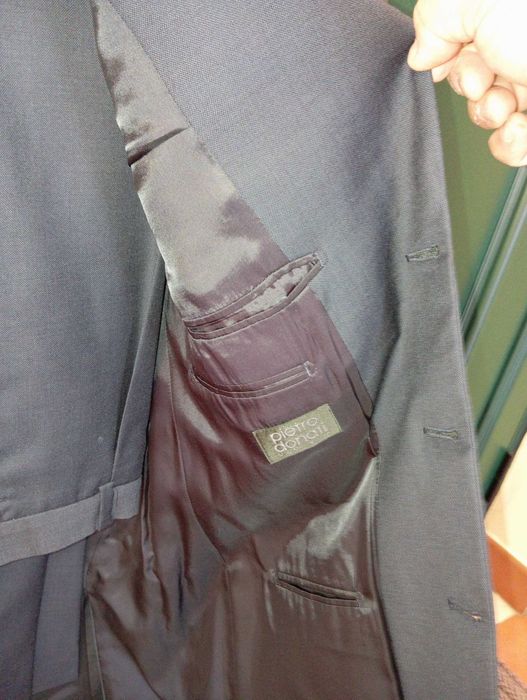 Fato de homem como novo