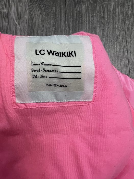 Стильна яскрава безрукавка для дівчинки