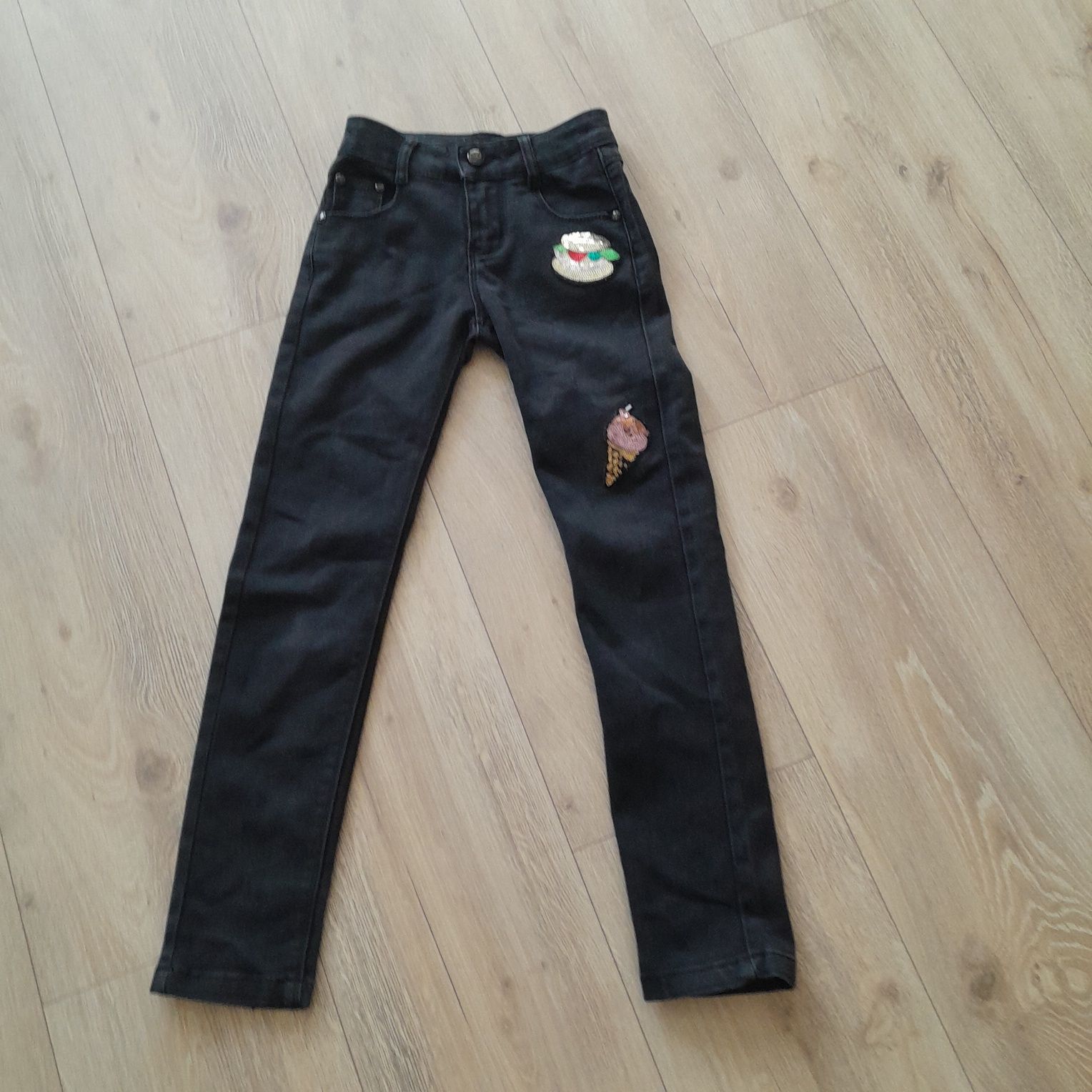 Czarne jeansy dla dziewczynki 134 cm