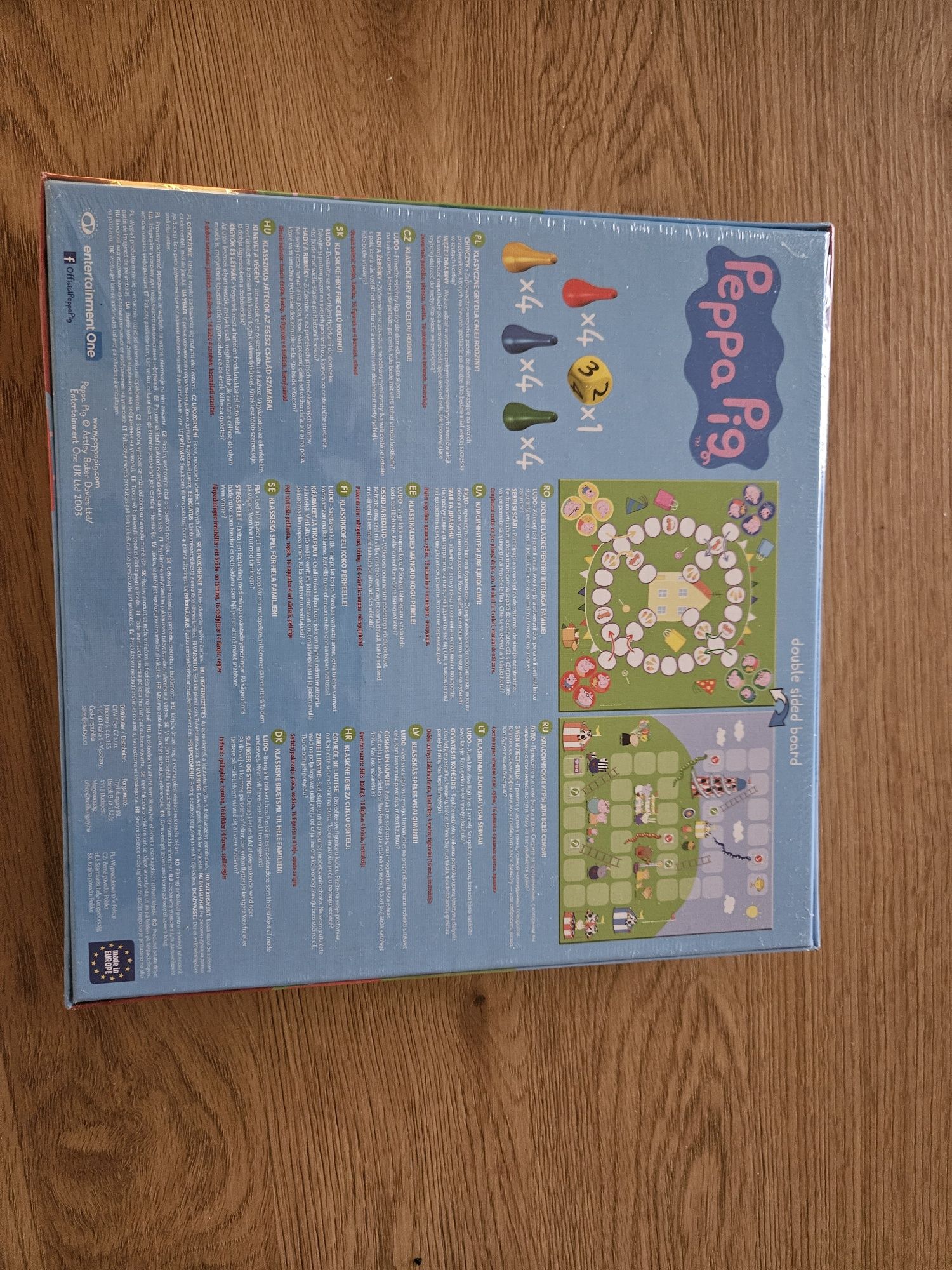 NOWA Ludo = Chińczyk. Snakes and ladders = Węże i drabiny. Peppa Pig