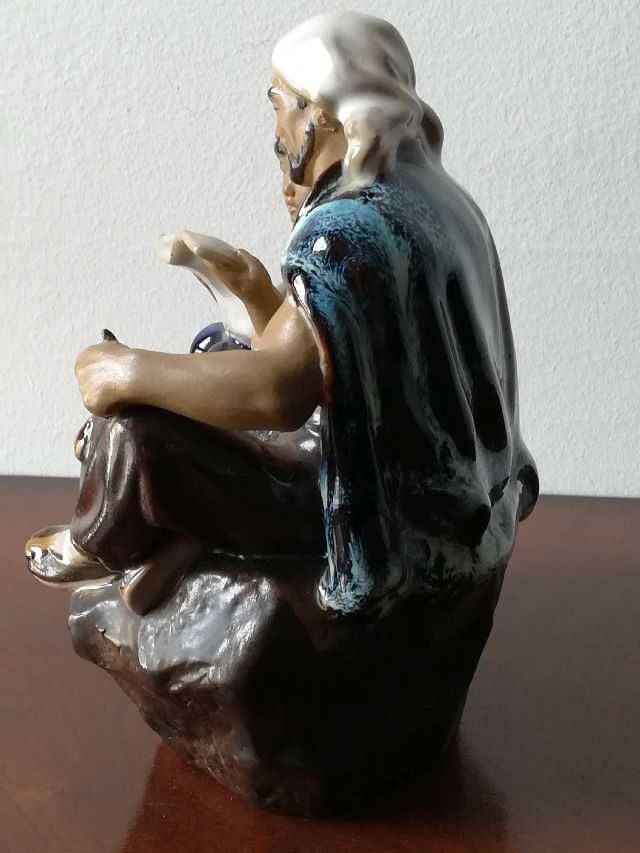 Figura de pai e filha chineses