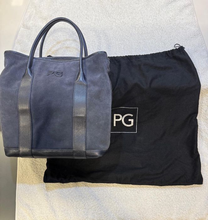 Mala azul escura da Purificacion Garcia