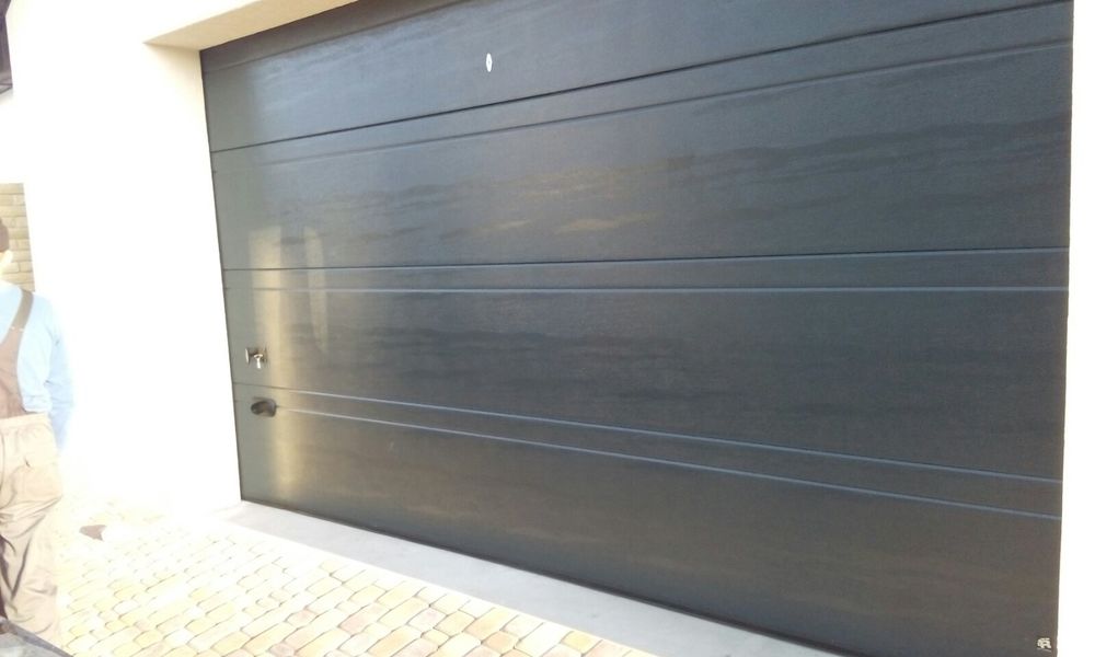 Гаражні секційні ворота відомих брендів. Ролети захисні