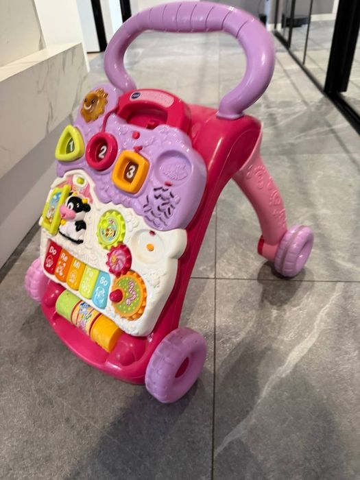 Дитяча каталка ходунки