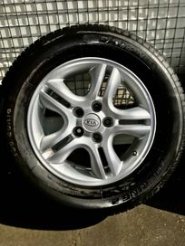 oryginalne felgi z Kia Sportage R16 z letnimi oponami 235/60R16