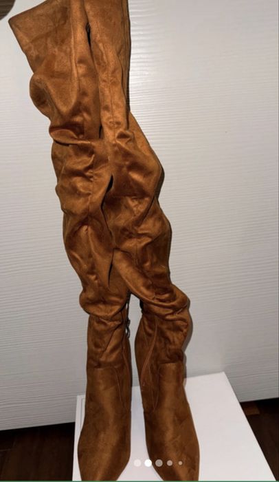 Botas cano alto enrugado