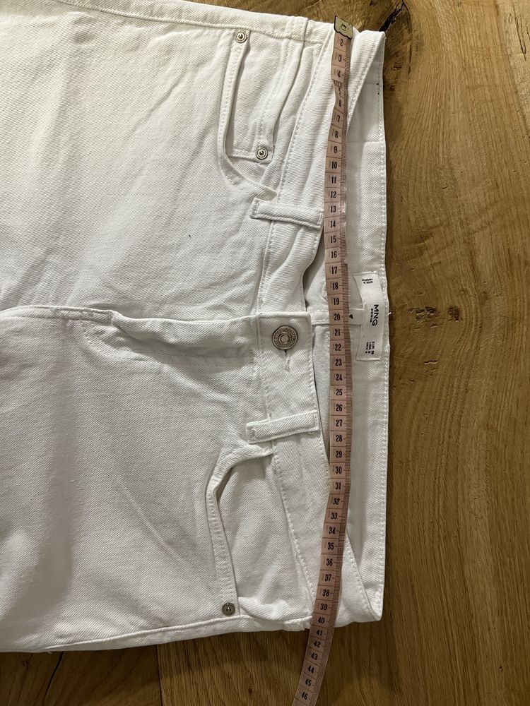 Białe spodnie skinny Mango
