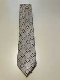 Męski, elegancki krawat jasnobeżowy