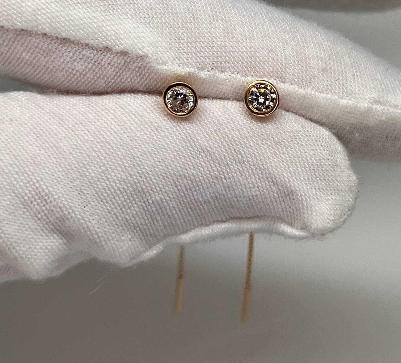Золоті сережки, вага 1,0 грам Арт. 556 та 1,51 грам Арт. 60