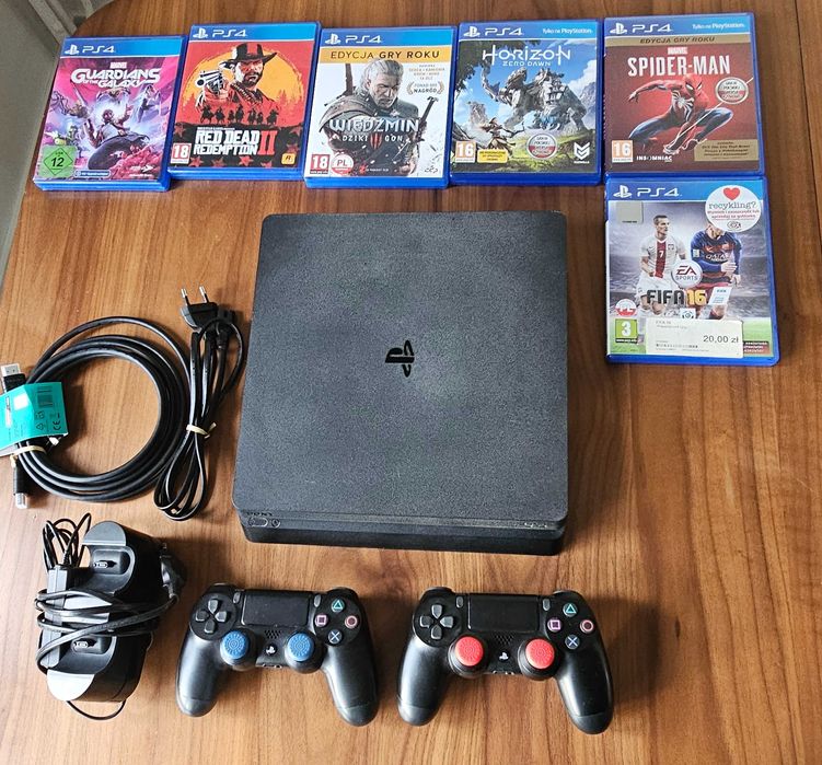 PS4 SLIM 1 TB + 2 pady, ładowarka do padów i 6 gier