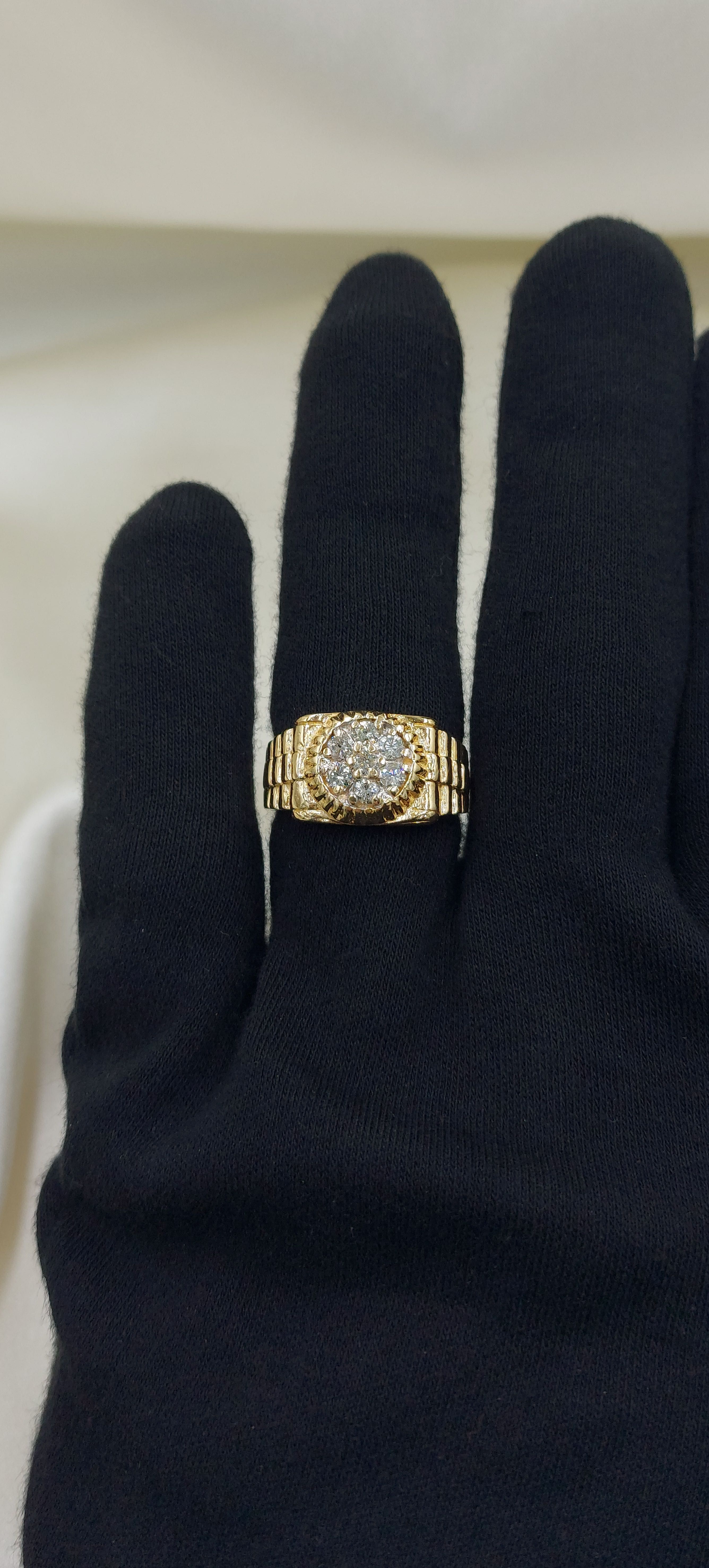 Złoty sygnet  Rolex z diamentami (brylantami).