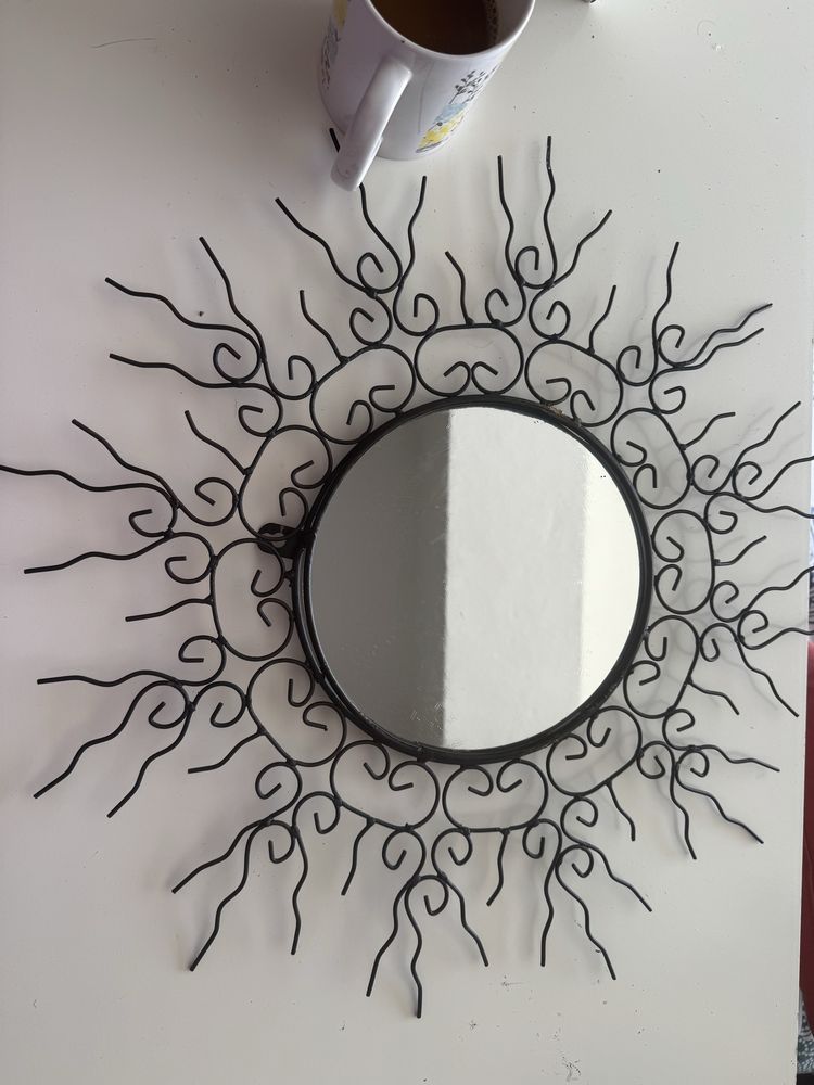 Espelho em forma de sol