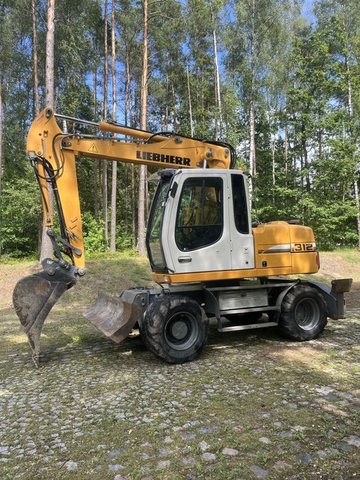 LIEBHERR A312 lift podpory koparka kołowa 314
