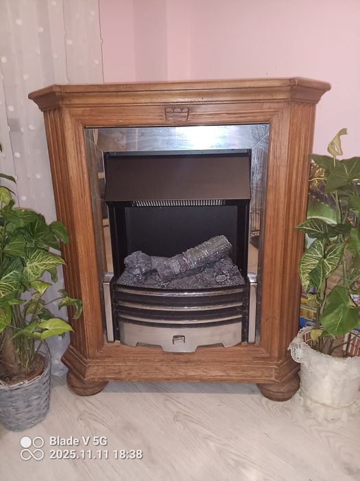 Kominek elektryczny DIMPLEX optimist w obudowie retro.