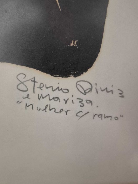 Quadro de mulher com ramo
