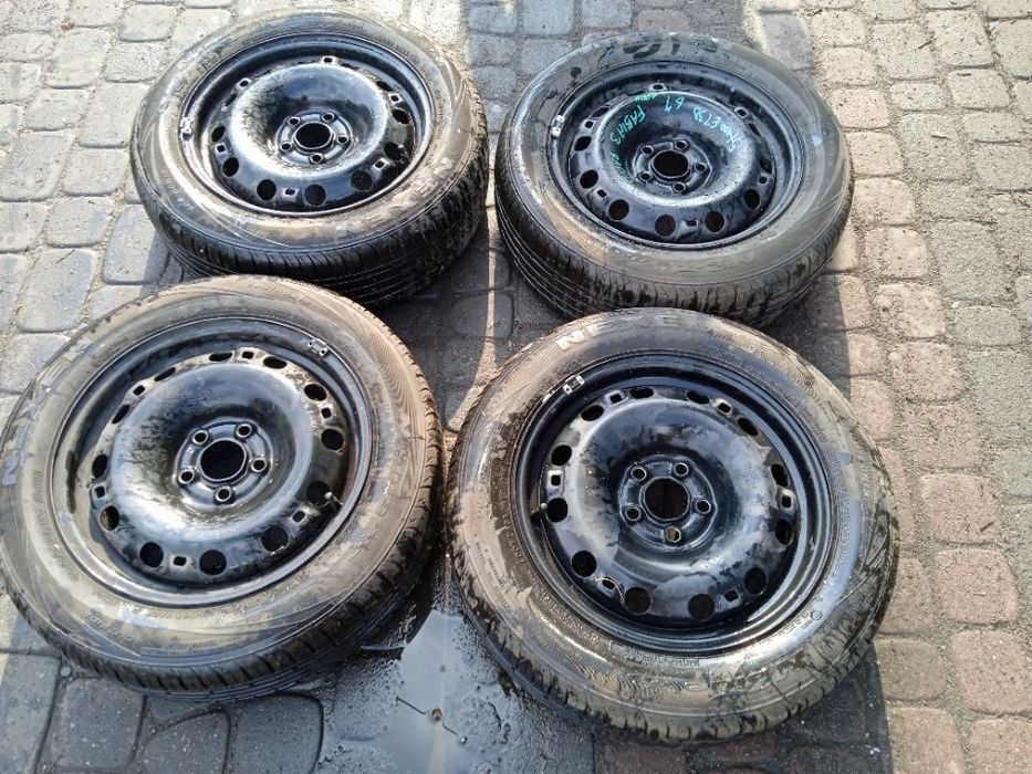 KOMPLET FELG Z OPONAMI LETNIMI FABIA II RAPID AUDI A1 VW POLO IBIZA 5x100 ET38 6J