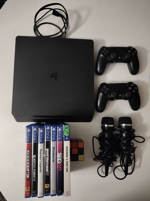 PlayStation 4 slim + 2 pady + 7 gier + 2 mikrofony
