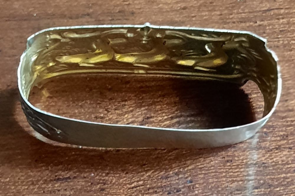 Bonito marcador de guardanapos em prata