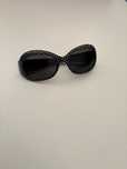 oculos de sol pretos